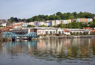 Colourful houses on hillside Clifton, Hotwells, from Floating Harbour, River Avon, Bristol,