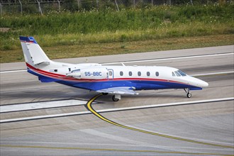 A Cessna 560XL Citation XLS aircraft of Air Adriatic with registration S5-BBC at Skiathos Airport,