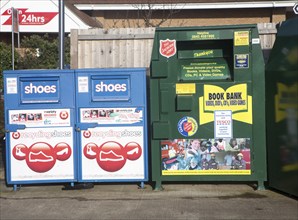 Shoe and Book Bank recycling collection containers at a Tesco store, UK