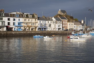 View of boats in the harbour in sunshine of winter afternoon, Ilfracombe, north Devon, England,