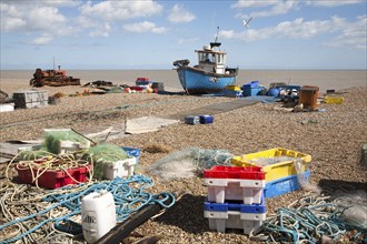 Fishing boats and equipment on the beach at Aldeburgh, Suffolk, England, United Kingdom, Europe