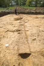 Archaeologists discover prehistoric field boundary ditch during excavation on new building plot,