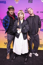 Andy Penn, Mieze Katz and Robert Bob Schütze from the band MIA. on the red carpet in front of the