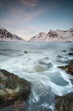 Long exposure, Winter evening mood at Skagsanden, Stones on the beach at Flakstad, Flakstadøy,