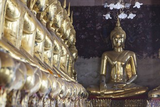 Golden Buddha statues, Bhumispara-mudra, Buddha Gautama at the moment of enlightenment, Wat Suthat