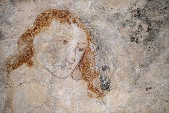 Portrait of a woman, early Gothic mural painting in the ribbed vault, chancel of the Romanesque St