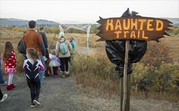 Lakewood, Colorado, Families enjoy the pre-Halloween Haunted Trail event at Bear Creek Lake Park