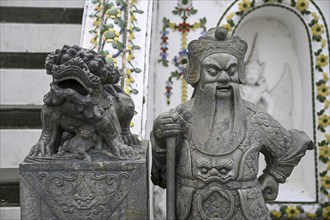 Stone statue of a Chinese warrior, guardian, Wat Arun, Temple of Dawn, Bangkok, Thailand, Asia