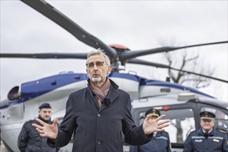 Minister of State Armin Schuster presents the new police helicopter together with State Police