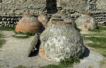 Antique wine jugs on the grounds of Svetitskhoveli Cathedral, UNESCO World Heritage Site of