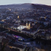 Evening atmosphere, view from the Schlossberg to the illuminated Murinsel and the