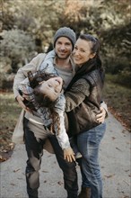 Parents with daughter, family photo