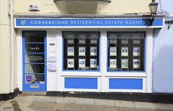 Cornerstone estate agent shop window Market Hill, Woodbridge, Suffolk, England, UK