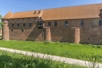 Nyborg Castle with round towers, medieval fortress with moat and ramparts, brick building Fyn, Fyn