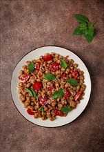 Tuscan pasta with smoked paprika and basil, parmesan cheese, Italian traditional cuisine