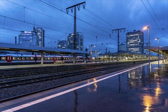 Train traffic, Essen central station, city centre skyline, North Rhine-Westphalia, Germany, Europe