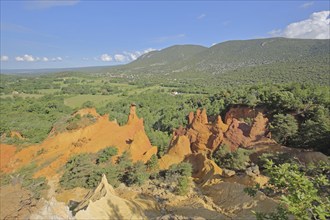 Landscape with red rock formations, ochre quarry, ochre rocks, red, bizarre, rocky landscape,