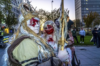 The Zombiewalk in Essen, on Halloween several hundred people, some dressed as scary zombies,