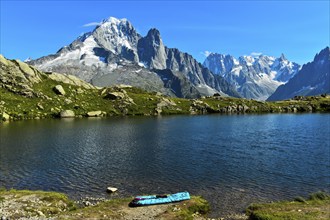 Bivouac site on the shore of the Lacs des Chéserys mountain lake in the Aiguilles Rouges nature