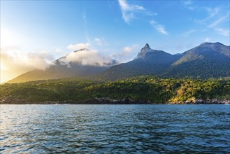 Mountains, forests and sea on the island of Ilhabela on the north coast of Sao Paulo during sunset,