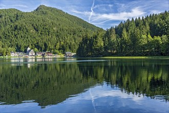 Mountain lake and village Spitzingsee, municipality Schliersee, behind mountain Schwarzenkopf,