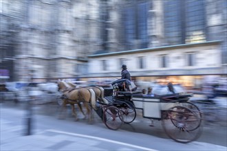 Horse-drawn carriage with gatemen on the move, Vienna, Austria, Europe