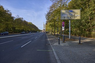 Signposts to Schöneberg, Charlottenburg and Wedding, Victory Column and autumnal trees in Berlin,