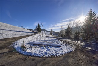 Hilly snowy landscape, roads, conifers, blue sky with veil clouds, Jostalstraße, Titisee-Neustadt,