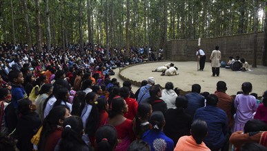 People enjoying a drama during 'Under The Sal Tree' Theatre Festival on December 15, 2021 in