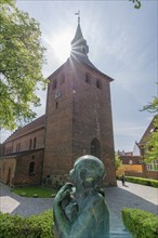 Svendborg Old Town, St. Nicolai Church, brick building, stepped gable, church tower, backlight,