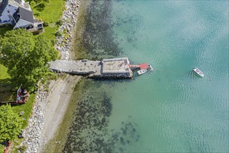 Campsite at the Sognefjord with pier for leisure boat, aerial view, Lustrafjord, Norway, Europe