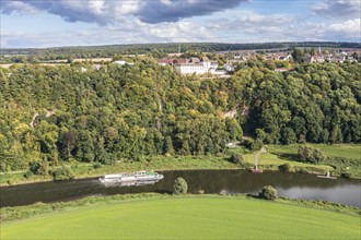 Aerial view of excursion boat on the Weser river passing castle Fürstenberg, Weserbergland,