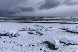 Ice floes on the beach, snowy, waves, sea, clouds, winter, Diamond Beach, Breidamerkursandur,