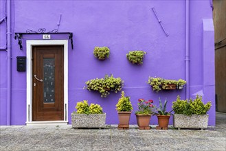 City view of Burano with colourfully painted houses and canals. Burano, Venice, Veneto, Italy,