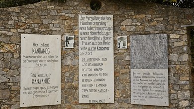 Detail of memorial plaques on a wall marking a historical site, visit of Federal President