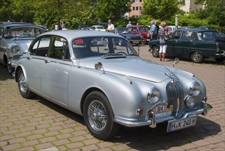 Silver vintage limousine at an outdoor car show, classic car, Jaguar 240, Jaguar Mark II, Lower