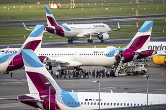 Düsseldorf Airport, Eurowings and Condor aircraft on the apron, on the taxiway to take-off,