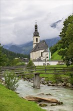 Parish church of St. Sebastian with Ramsauer Ache, rainy weather, fog, bridge, Ramsau,