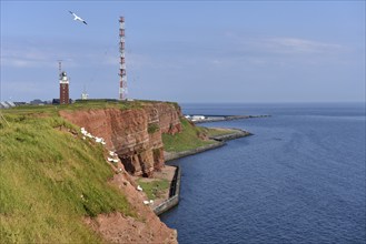 Lighthouse and radio mast on the offshore island of Heligoland, Schleswig-Holstein, Germany, Europe