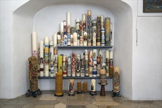 Sacrificial candles offered for sale in the pilgrimage basilica Maria Brünnlein, Wemding, Swabia