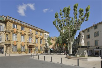 Town hall with flags and fountain with monument to engineer Adam de Craponne, Hôtel de Ville,