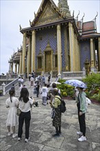 Tourists at Wat Phra Kaew, Temple of the Emerald Buddha, Bangkok, Thailand, Asia