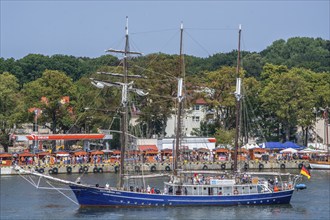 The three-masted schooner Santa Barbara Anna sails on the river Swina in Swinoujscie, Western