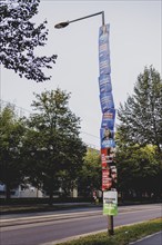 Election posters hanging from a lamppost, taken in Dresden, 31 August 2024. A new state parliament