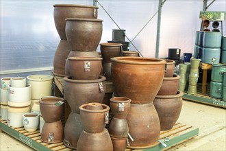 Earthenware natural clay frost proof planter pots made by Woodlodge at Swanns Nursery garden