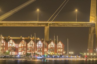 Stavanger, suspension bridge ByBrua over the fjord at night, leisure boats at marina, Stavanger,