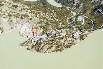 Aerial view of lake Grimsel and Grimsel Hospiz, construction work of new dam, Switzerland, Europe