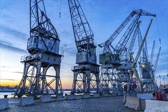 Harbour cranes on the Scheldekai, the world's largest collection of historic cranes, are part of