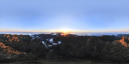 360 panorama of aerial drone view of mountains over clouds near Pico Ruivo on sunset. Madeira