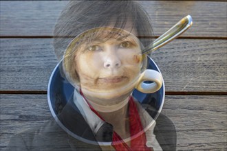 Woman and Coffee Cup in Switzerland